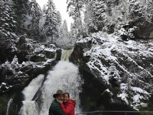 Awesome shot of Jennifer and her husband Victor, backed by one of the Black Forest's famous waterfalls, near Triberg, Germany.